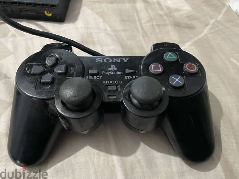 PS2 console with controller 3