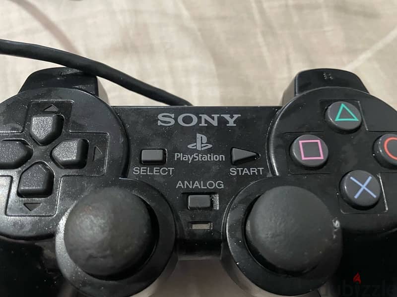 PS2 console with controller 4