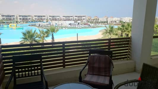 Two-bedroom chalet for sale in Amwaj Sidi Abdel Rahman, directly on the swimming pool