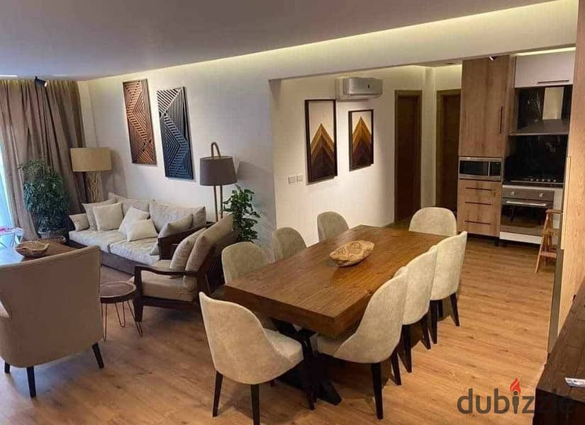 Inspect and receive an apartment for sale in Al Marasem (Fifth Square), fully finished, with a very distinctive view on the landscape 0