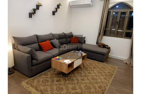 Furnished studio for rent, ground floor, with a private garden, with the latest furniture, near Gates 19 and 17