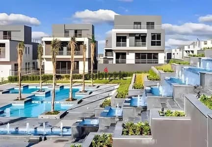 With a down payment of 2 million, a townhouse for sale, 245 m, in Patio Town Compound, Fifth Settlement, next to the American University and 10 minute