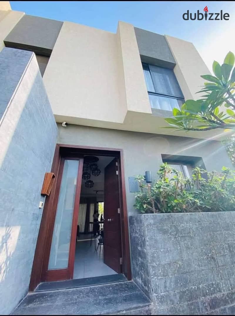 Duplex for sale (176 sqm + 60 sqm garden), fully finished, immediate receipt, in the finest compound  (zodiac sign)   In front of the International Me 0