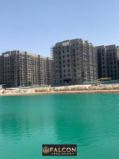 Receive a 142-meter apartment with a panoramic view of the sea and the lagoon, fully finished, Alamein Towers view, in installments