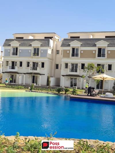 Fully finished townhouse villa, immediate delivery, 0% down payment, in installments, in Mountain View 4 Compound, near Dreamland and Mall of Egypt