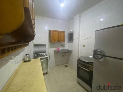 furnished ground apartment 100 meters three rooms for rent buildings College of Girls Nasr City behind the Air Defense House close to Nozha Street