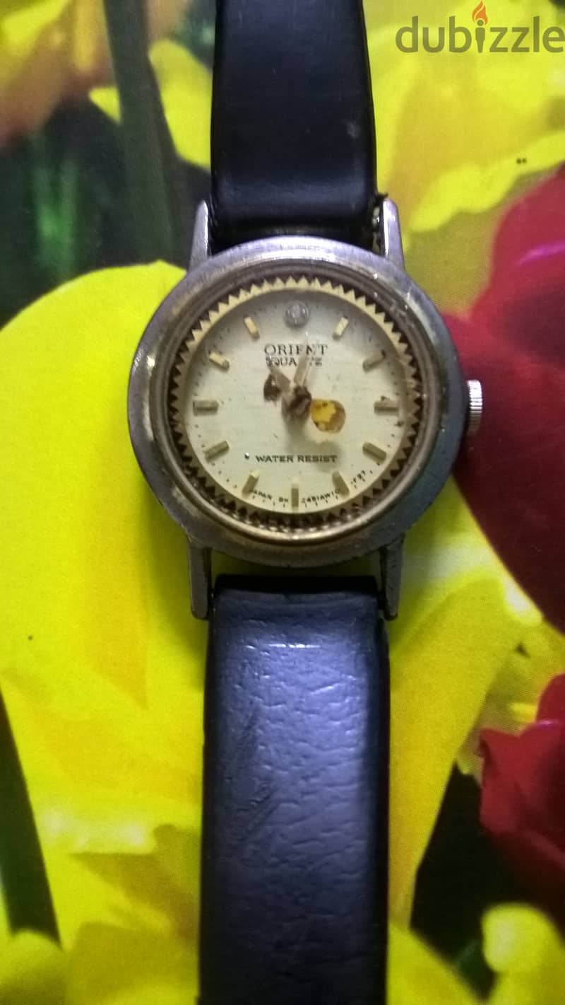 Orient Japanese watch and Christian Markle Swiss watch 4