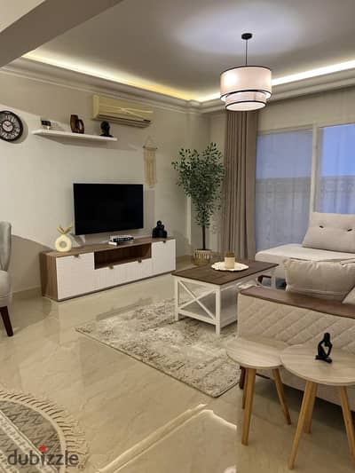 For rent in Madinaty, furnished apartment, 211 sq. m. , hotel furniture, special finishes, on the Wide Garden, in front of the food and movement