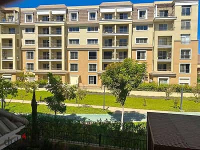 Apartment for sale in a fully serviced compound in Sarai Compound with a 50% discount + installments up to 12 years