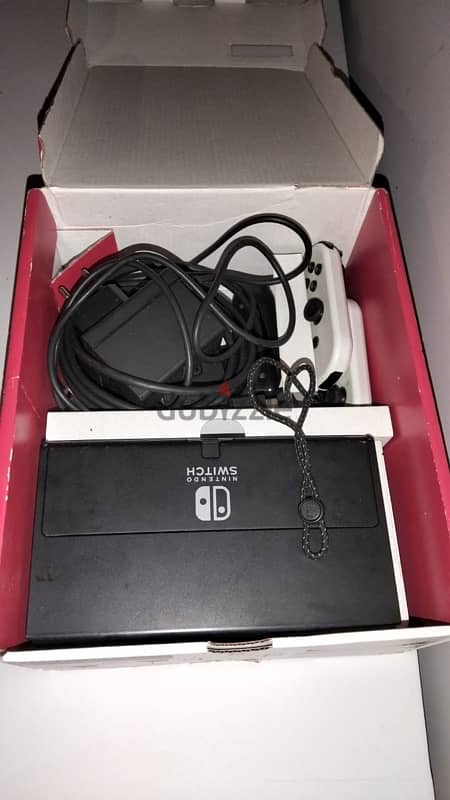 Nintendo Switch OLED 64GB in good condition 1