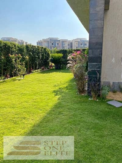 Ground floor apartment with garden, 2 rooms for sale with 42% discount in installments in Tag City, in front of Cairo Airport