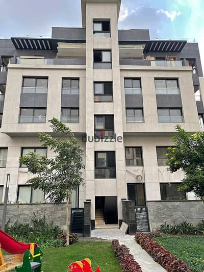 With a 5% down payment, a 195-square-meter apartment for sale, fully finished, in the [Trio Gardens] Compound, Fifth Settlement, with a distinctive vi