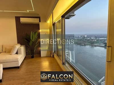 Apartment for sale with great investment opportunity, immediate receipt, next to Hilton Maadi, a hotel tower directly on the Nile, Reef de Nile Tower