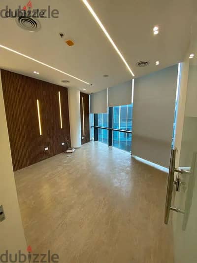 For rent a finished office with air conditioners two rooms, a reception and a bathroom next to Saudi Market on the main street, Ritzy Mall Sheikh Zaye