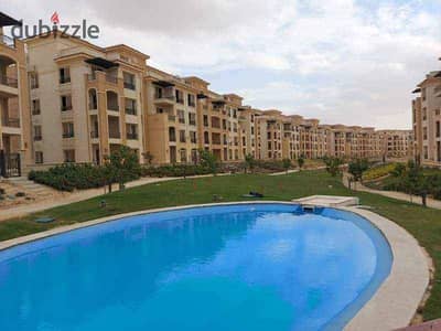 Apartment for sale, 3 rooms, in installments over 10 years, with a clear view of the swimming pool, in Stone Park Compound, fully inhabited and fully