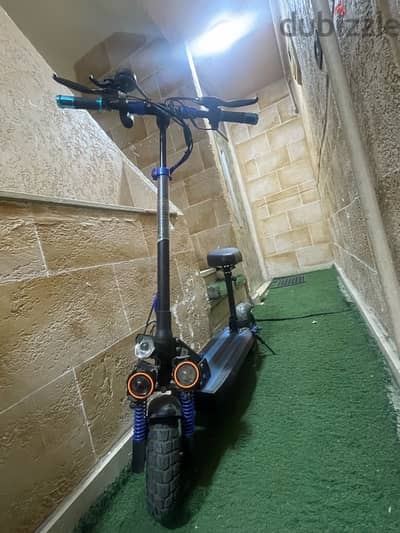 electric kick scooter seated سكوتر كهربائي بكرسي