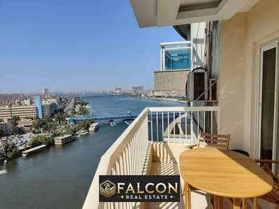 Fully furnished hotel apartment ready for occupancy, delivery within months, with a distinctive view of the Nile Corniche, next to the Hilton Hotel