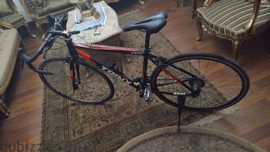 Road bike Trinx r300 للبدل بعجله هايبرد