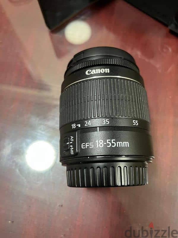 كاميرا كانون Canon 250D معاها الشنطه بتاعتها و حامل الكاميرا بتاعها 3