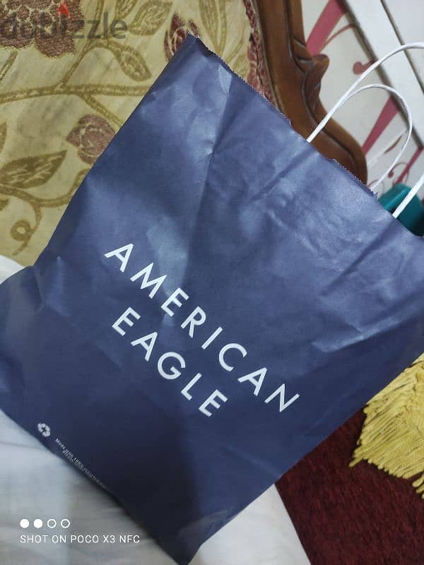 بالتيكت و مستورد American eagle jeans بنطلون 1