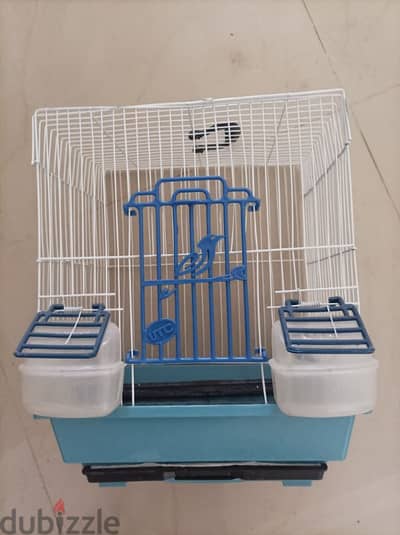 very new bird cage