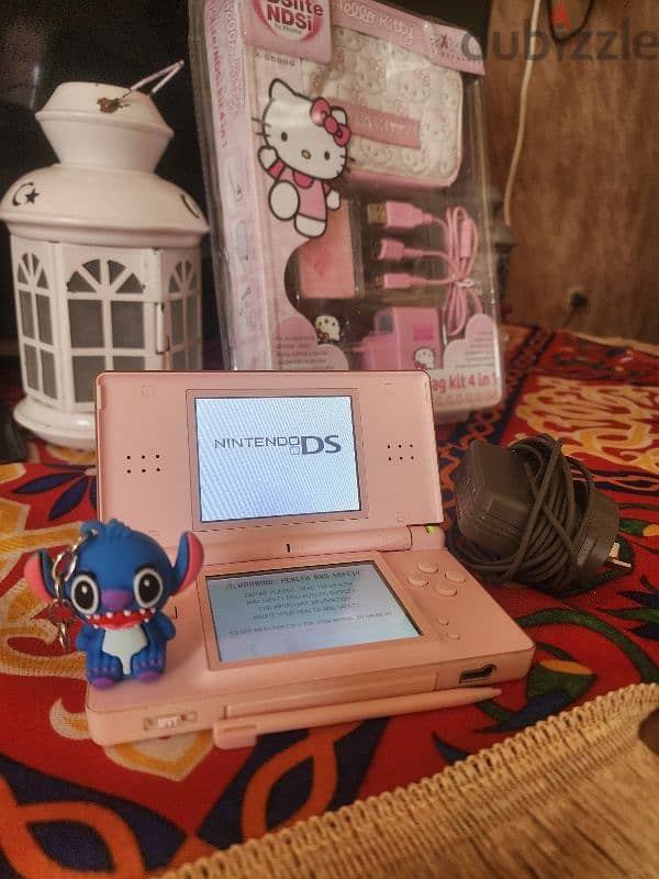 pink Nintendo ds lite with hello kitty accessories 2