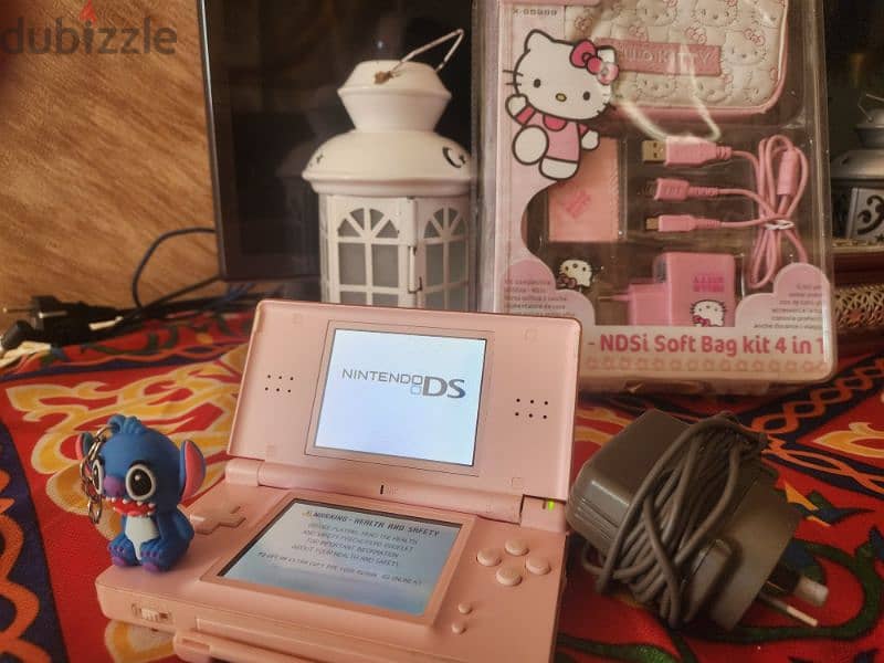 pink Nintendo ds lite with hello kitty accessories 3