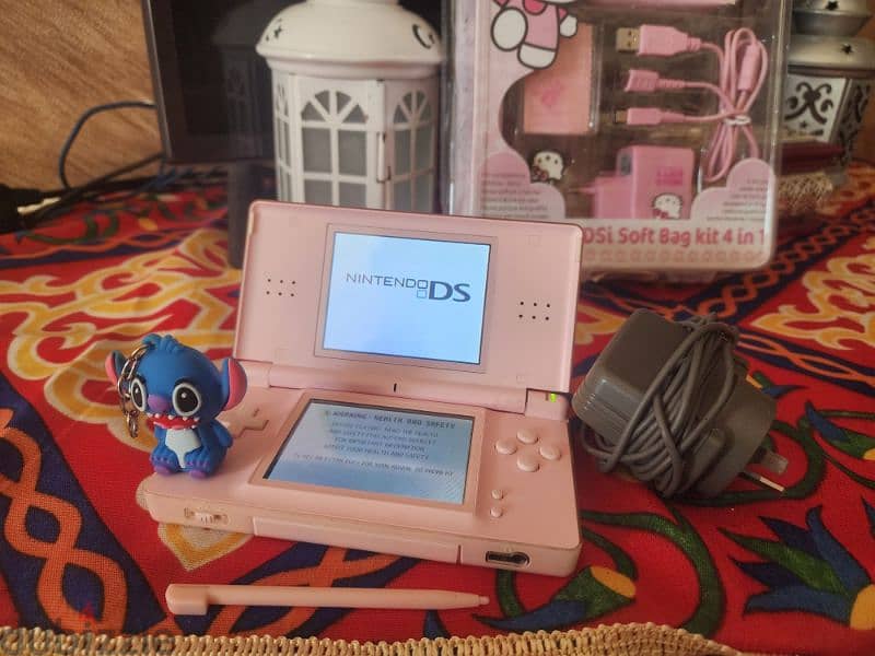 pink Nintendo ds lite with hello kitty accessories 4