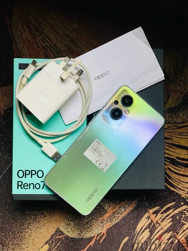 oppo reno 7 z 5g معاه جميع مشتملاته 0