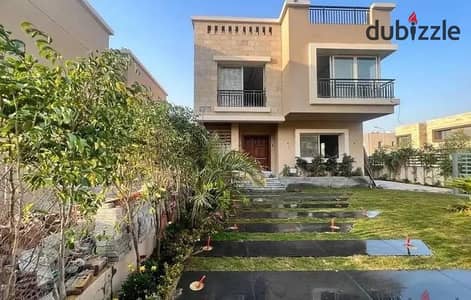 For sale, a double-view villa in Taj City, in front of Cairo Airport, minutes from 90th Street, Nasr City and the Fifth Settlement