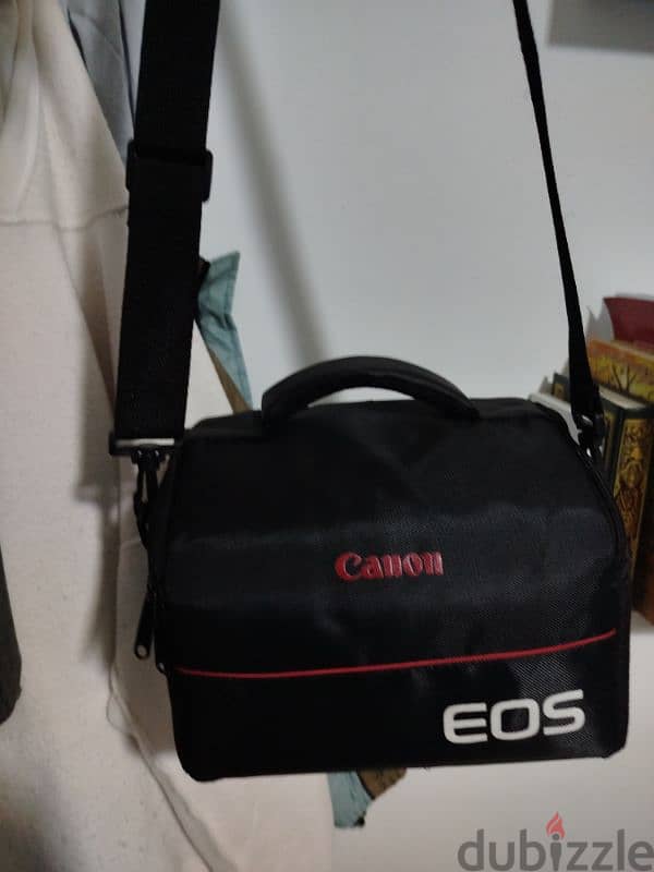 canon  1300D+شنطة كانون+ستراب الاصلي+ عدسة 55 1