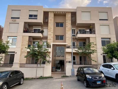 Apartment for sale without down payment and installments over 12 years in Taj City Compound in the First Settlement on Suez Road in front of airport