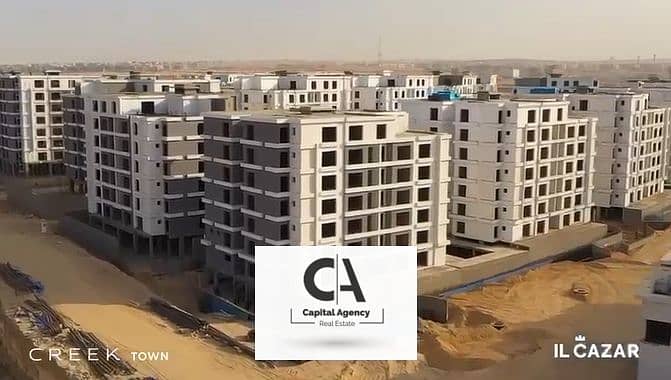 Apartment for sale in Garden City, one year delivery, in the Fifth Settlement, in Creek Town Compound, directly in front of Rehab | Down payment of on 0