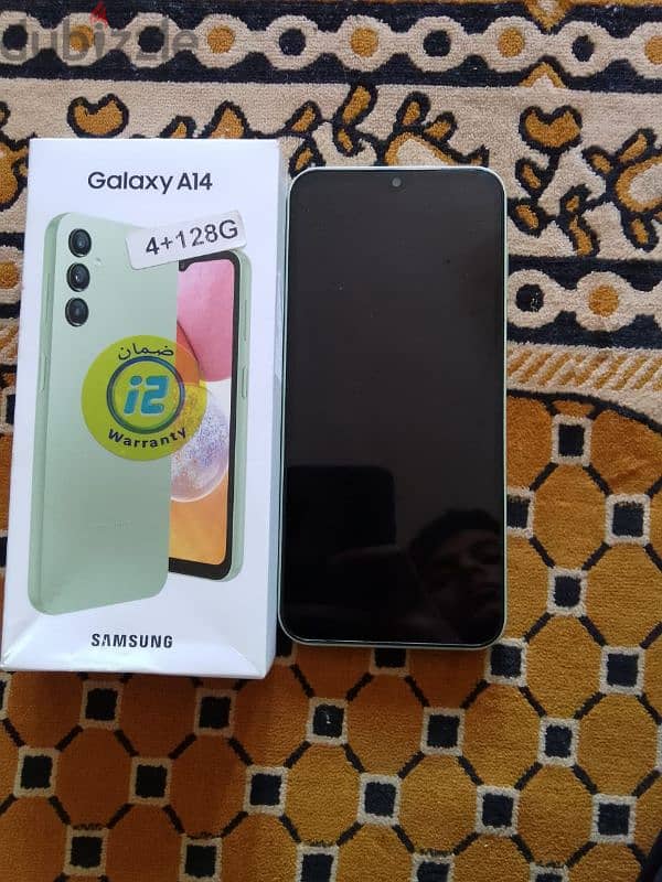 تلفون Samsung  A14  مش مغير حاجة ومفهوش خبطه معاه الكرتونه بتعته وشاحن 1