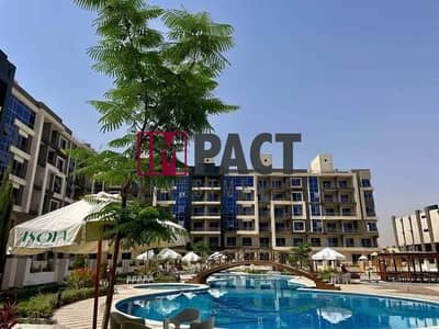 Apartment for sale next to Sheraton Heliopolis Airport at an attractive price, with a distinctive view of the swimming pool and landscape