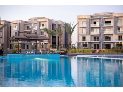 Ground apartment with garden for sale fully finished & overlooking swimming pool & landscape direct at galleria moon valley - new cairo