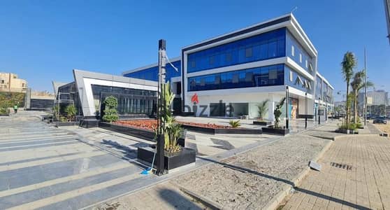 Office for rent 122 m in Trivium at a special price in front of Capital and Park Street, second number from the 26th of July axis and near Hyper One