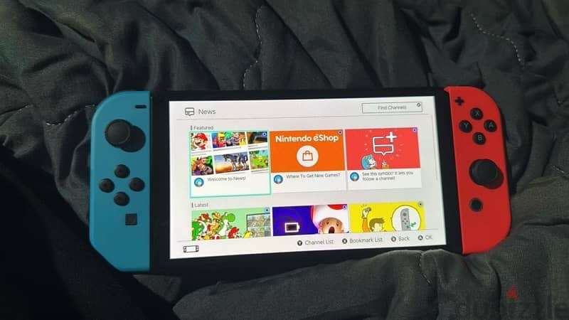 Nintendo Switch (OLED Model) - Neon Red and Blue (UAE Version) 1