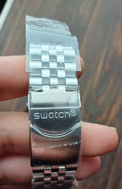 ساعة سواتش جديدة لم تستخدم باستيكرات الوكيل swatch 9