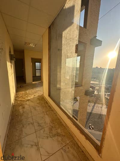 Clinic for rent in a mall in El Shorouk, overlooking a large garden