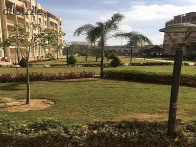 Apartment for rent in Madinaty, 113 m, ground floor with a 50 m garden, in B11 area, with 2 bedrooms and 2 bathrooms, in a prime location and facing w