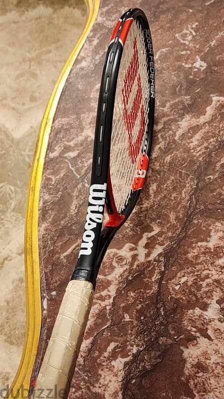 onyx and Willson tennis rackets 5