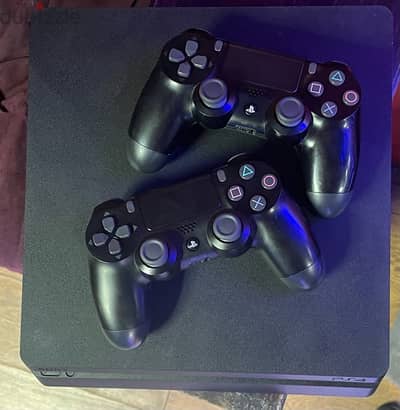 PlayStation 4 slim with 2 original controllers