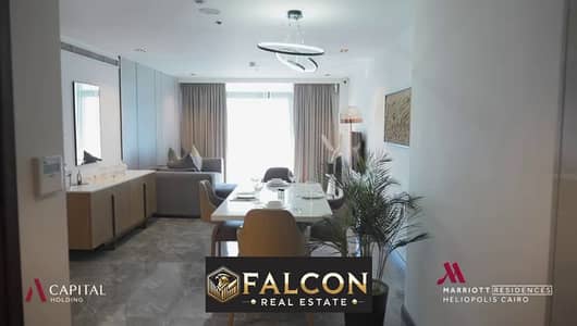 own a fully finished apartment with Acs  in the Marriott Residences, Heliopolis