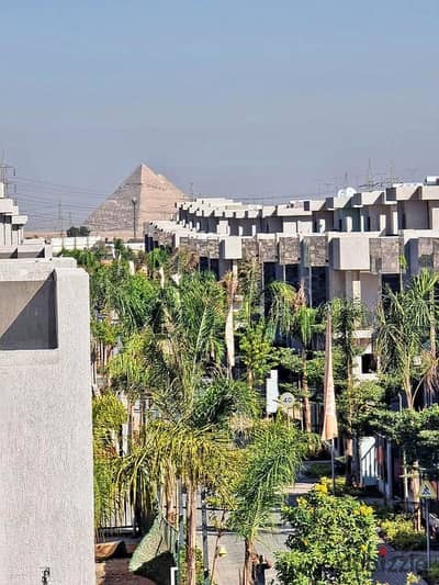 A special apartment for sale in 6th of October, at a great price with immediate delivery and one-year receipt, offering a view of the Pyramids.