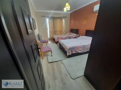 Furnished apartment with air conditioning for rent in Rehab 2 in the ninth phase with elevator Overlooking the garden and Avenue Mall