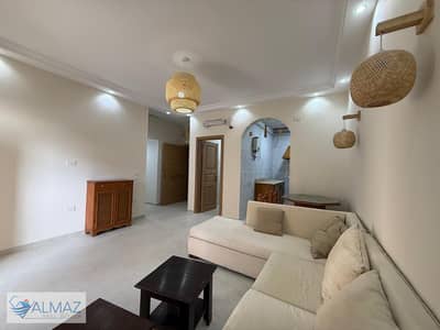 Furnished apartment for rent in Al Mostashareen Compound in the Fifth Settlement Courts of Appeal, branching off from Mohamed Naguib Axis