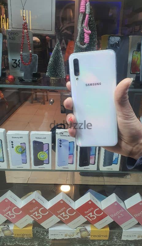 Samsung A50 : 128/4 عايز معالج أو بورده 2