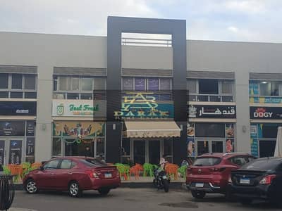 Restaurant for rent in Madinaty, Craft Zone, with an outdoor area of 40 sqm and a block-facing location in a prime spot.