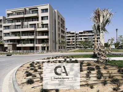 Apartment * Resale * with garden Ready To Move in Capital Gardens Compound Palm Hills with a view of the lagoon - distinguished location